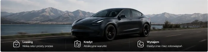 Tesla Model Y na drodze nad jeziorem w górach